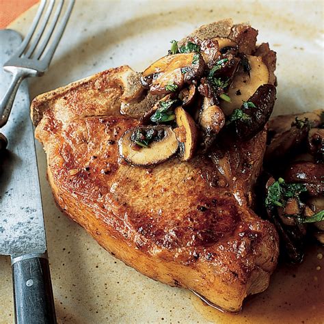 pan-fried-veal-chops-with-mushrooms-and-cilantro image