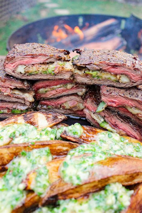 stuffed-skirt-steak-over-the-fire-cooking image