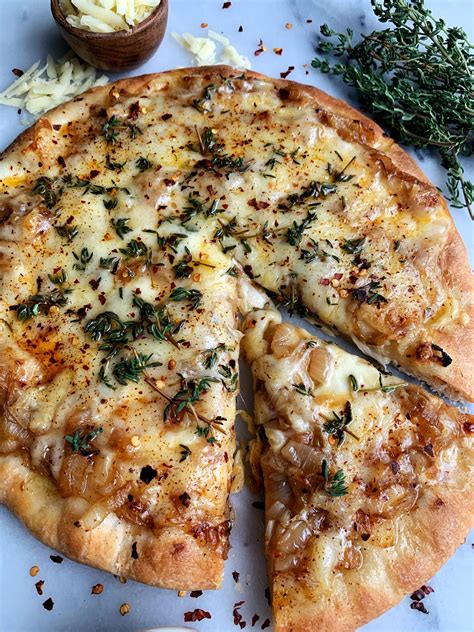 the-most-cheesy-french-onion-soup-pizza image