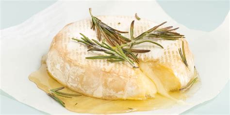 baked-brie-with-honey-and-rosemary-delish image