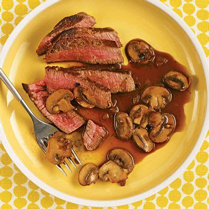 beef-tenderloin-with-mushroom-red-wine-sauce-myrecipes image