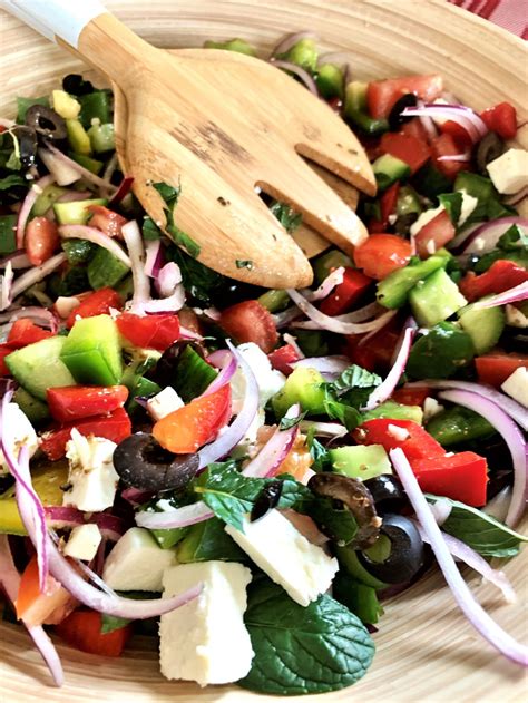 greek-salad-with-a-pomegranate-molasses-dressing image