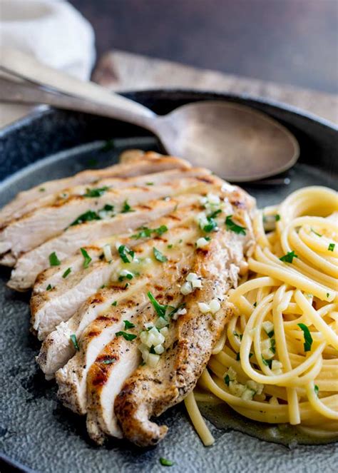 garlic-butter-pasta-with-garlic-chicken-sprinkles-and-sprouts image