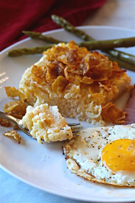 cheesy-hash-brown-potatoes-casserole-with-corn-flakes image