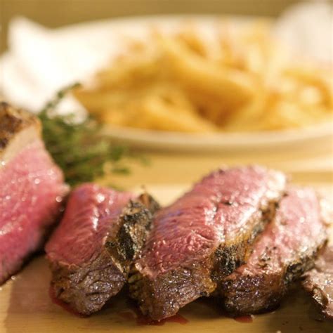 seared-tri-tip-steak-with-bearnaise-sauce-and-pommes image