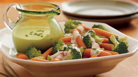 broccoli-and-carrots-with-creamy-parmesan-sauce image