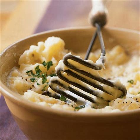 creamy-herbed-mashed-potatoes-recipe-myrecipes image