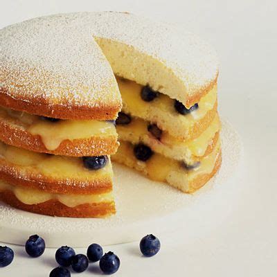 lemon-layer-cake-with-curd-and-blueberries image
