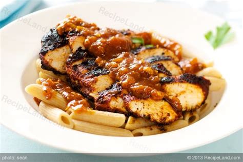 blackened-chicken-strips-on-pasta-with-cajun-sauce image