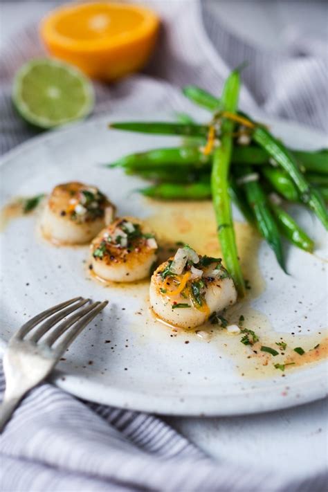 pan-seared-scallops-with-citrus-sauce-feasting-at-home image