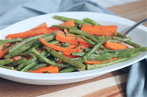 easy-and-delicious-herbed-green-beans-and-carrots image