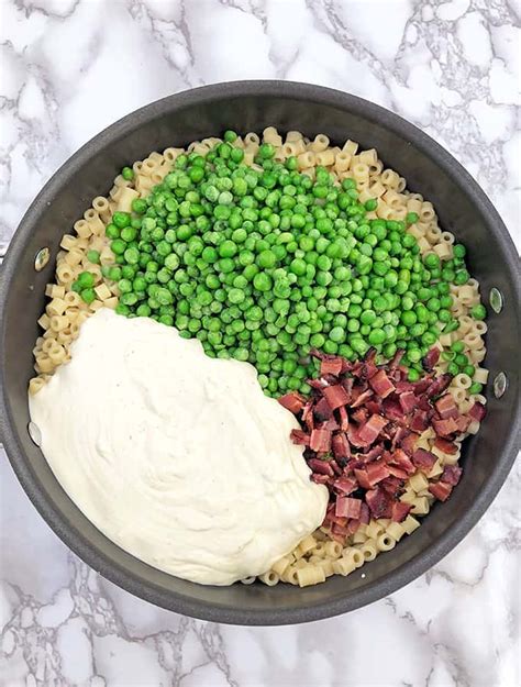 creamy-pasta-with-bacon-and-peas-ready-in-under-30 image