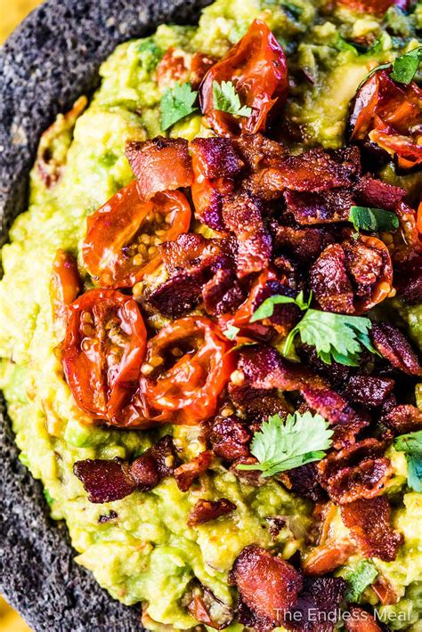 bacon-guacamole-with-roasted-garlic-and-tomatoes image