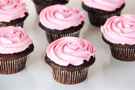 chocolate-cupcakes-with-pink-marshmallow-buttercream image