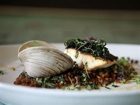 plancha-grilled-striped-bass-with-creamed-kale-blanched image