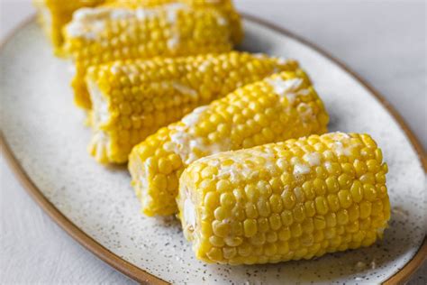 steamed-corn-on-the-cob-recipe-the-spruce-eats image