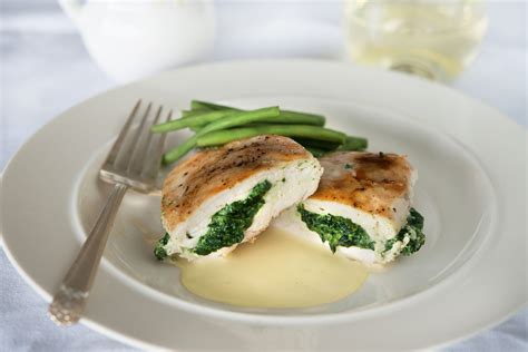 spinach-and-artichoke-stuffed-chicken-breast-the image