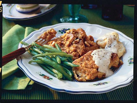 fried-pork-chops-with-cream-gravy-recipe-southern image