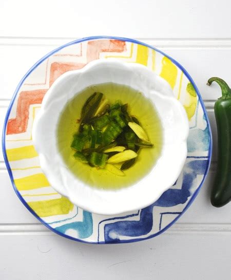 jalapeno-garlic-infused-oil-recipe-savor-the-thyme image