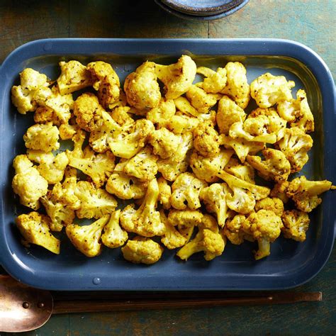 turmeric-roasted-cauliflower-eatingwell image