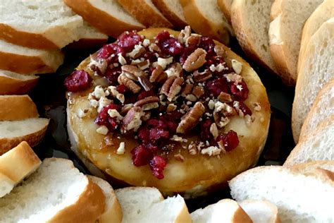 cranberry-pecan-baked-brie-a-quick-easy-appetizer image