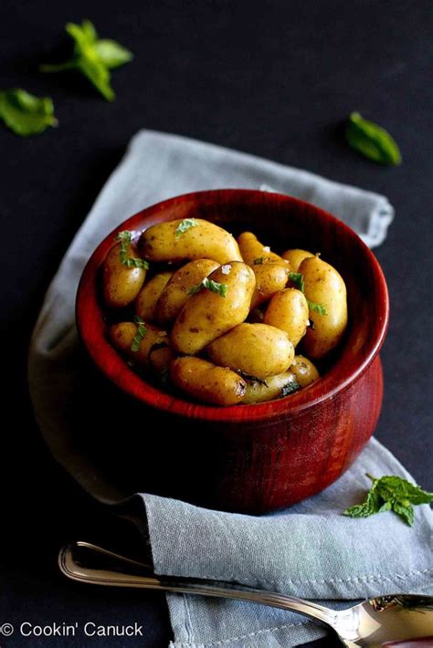 boiled-potatoes-with-olive-oil-fresh-herbs-cookin-canuck image