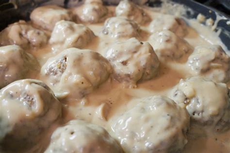 savory-baked-meatballs-with-brown-mushroom-gravy image