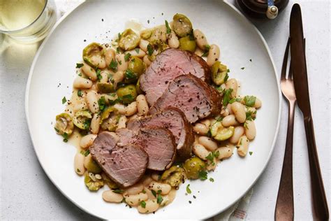 olive-brinemarinated-pork-with-roasted-olives-and-beans image