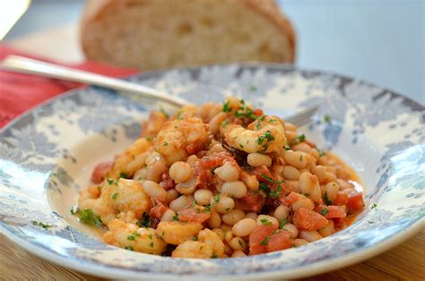 garlicky-shrimp-with-white-beans-and-tomatoes image