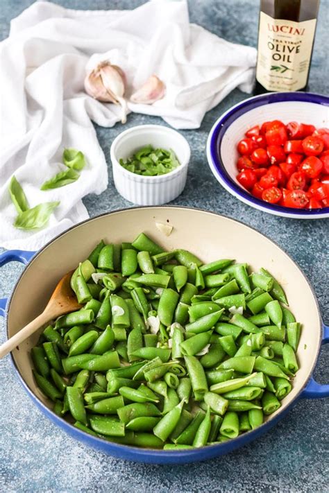 sugar-snap-peas-with-marinated-cherry-tomatoes-tasty image