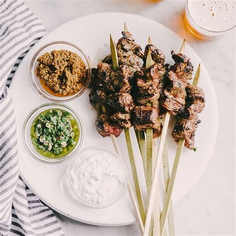 steak-skewers-with-dipping-sauce-trio-our-salty image