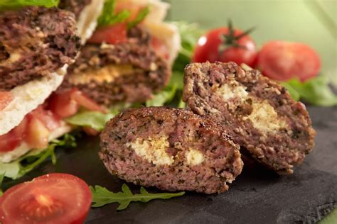 greek-burgers-stuffed-with-spicy-feta-diane-kochilas image