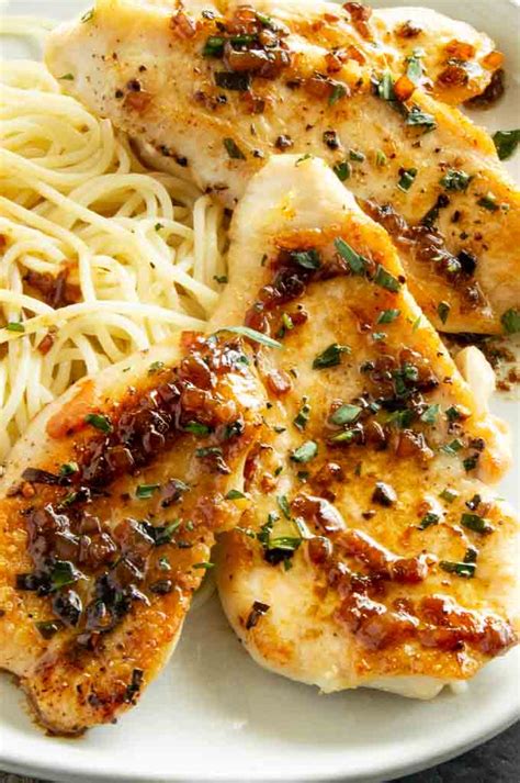 tarragon-shallot-sauce-on-stove-top-chicken-breasts image
