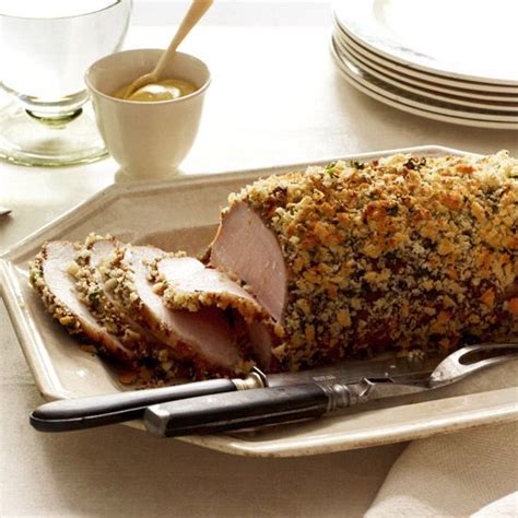 herb-and-garlic-crusted-pork-roast-better-homes image
