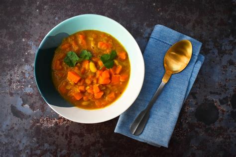 carrot-turmeric-and-white-bean-soup-tinned-tomatoes image
