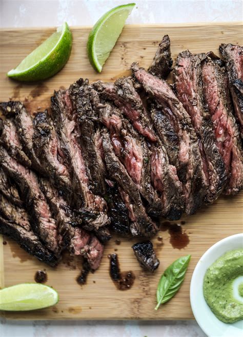 skirt-steak-with-avocado-pesto-and-grilled-corn-relish image