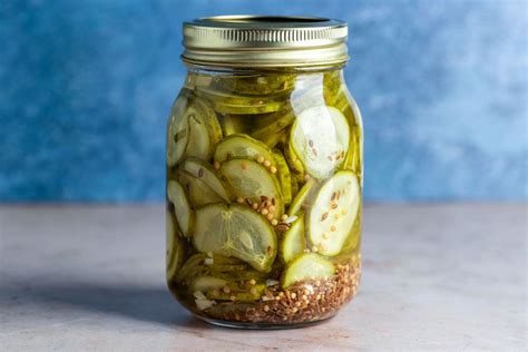 canned-or-jarred-dill-pickle-slices-recipe-the-spruce image
