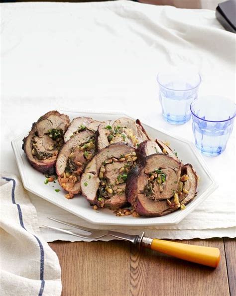 spinach-and-pine-nut-stuffed-leg-of-lamb-country-living image