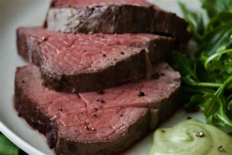 slow-roasted-filet-of-beef-with-basil-parmesan image