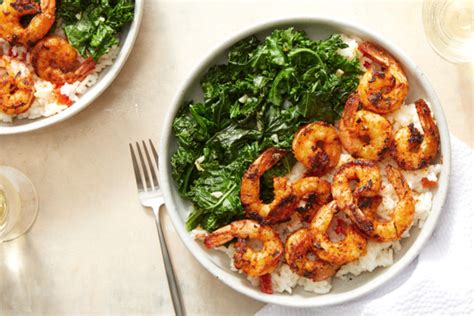 cajun-spiced-shrimp-over-creamy-rice-with-sauted-kale image