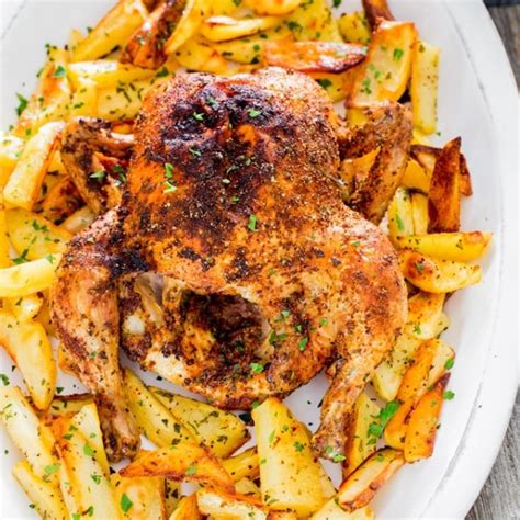 roast-chicken-with-roasted-potatoes-jo-cooks image