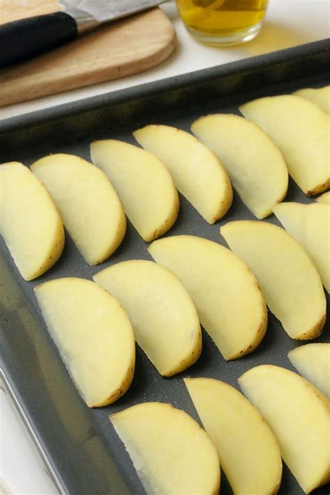 cheesy-oven-fries-texanerin-baking image