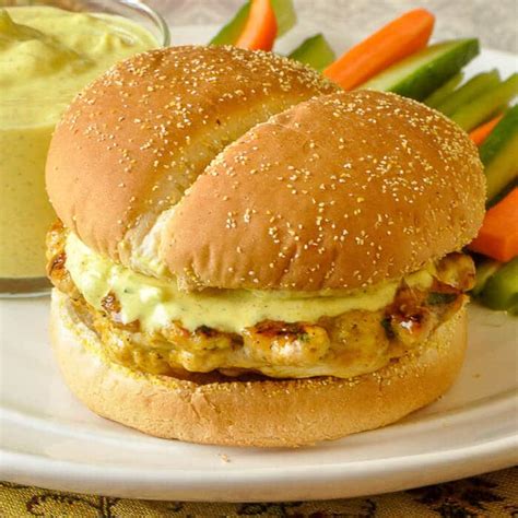 easy-curry-chicken-burgers-on-ditaliano-crustini-buns image