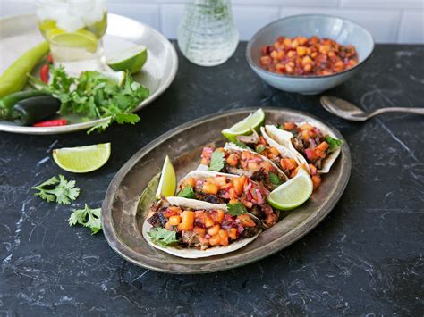 carnitas-tacos-with-peach-salsa-recipe-kitchen-stories image