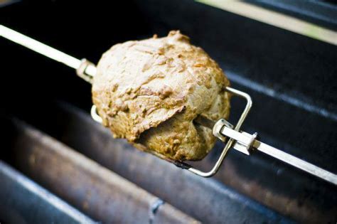 mustard-crusted-eye-round-roast-on-the-rotisserie image
