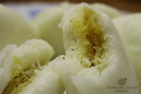 lotus-leaf-buns-steamend-with-sweet-coconut-jaggery image