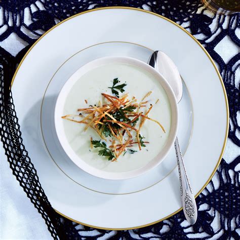 leek-soup-with-shoestring-potatoes-and-fried-herbs image