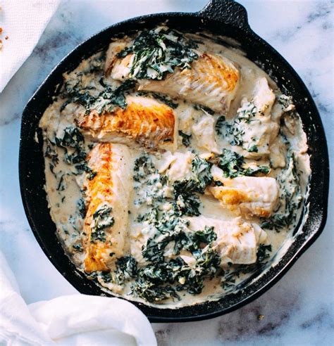 herbaceous-baked-cod-with-spinach-white-sauce image
