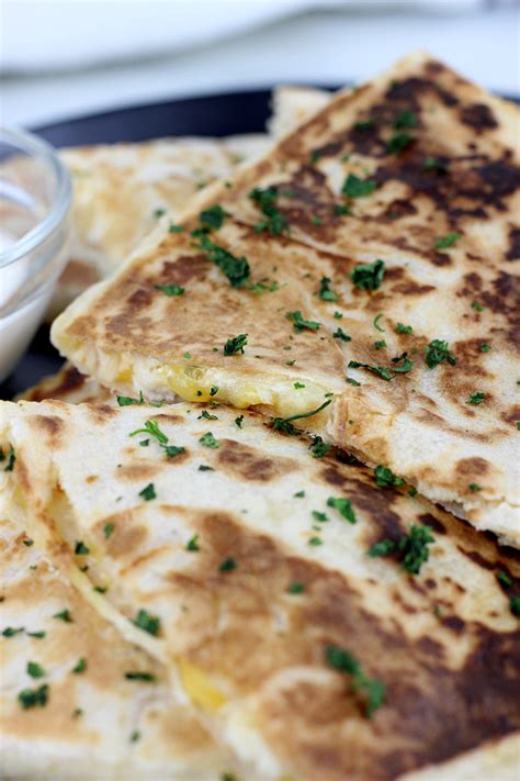 spicy-cheesy-chicken-quesadillas-with-a-jalapeno-sauce image