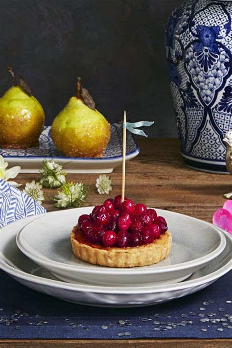 cranberry-frangipane-tarts-good-housekeeping image